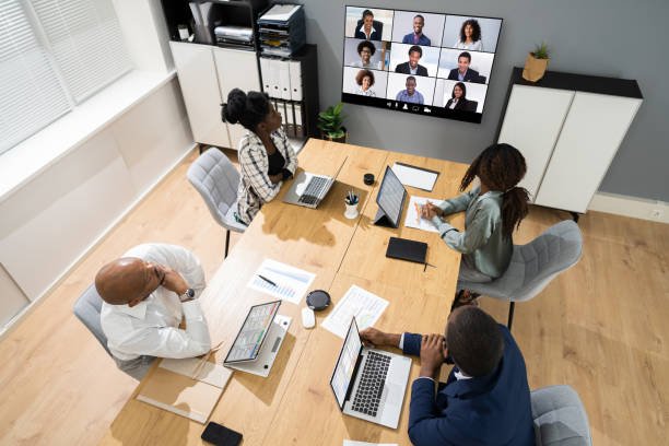 african group on screen in video conference meeting call